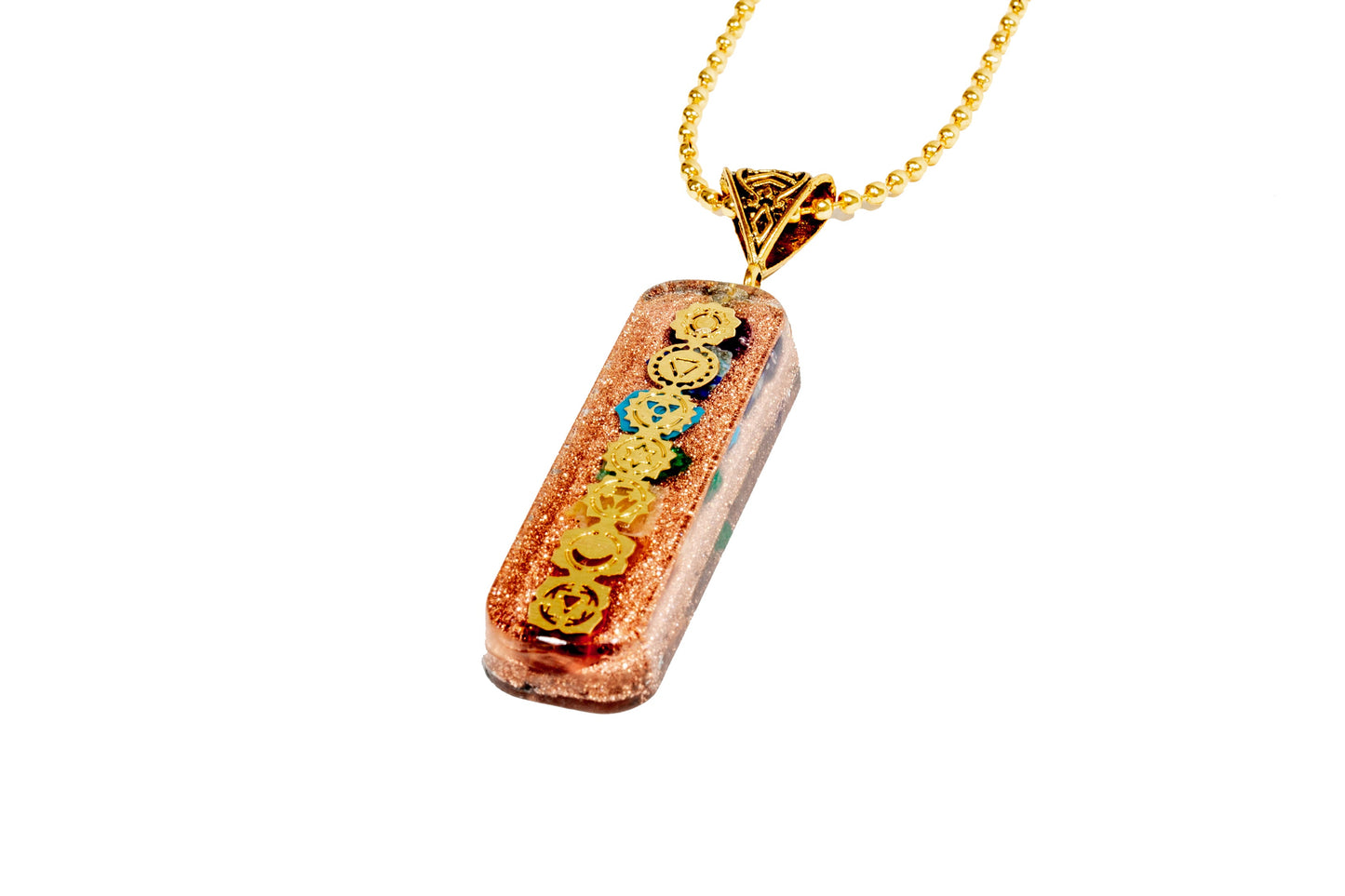 7 chakra orgone copper pendant with gold-tone chain, colorful chakra symbols, resin finish, and copper accents. — for Carpe Diem Dream