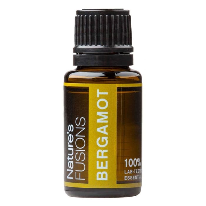 A 15ml amber glass bottle of Bergamot essential oil with a black ribbed cap and yellow label displayed on a white background. — for Carpe Diem Dream