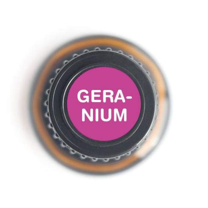 Top view of a 15ml amber glass bottle of Geranium essential oil with a black cap and magenta label on a white background. — for Carpe Diem Dream