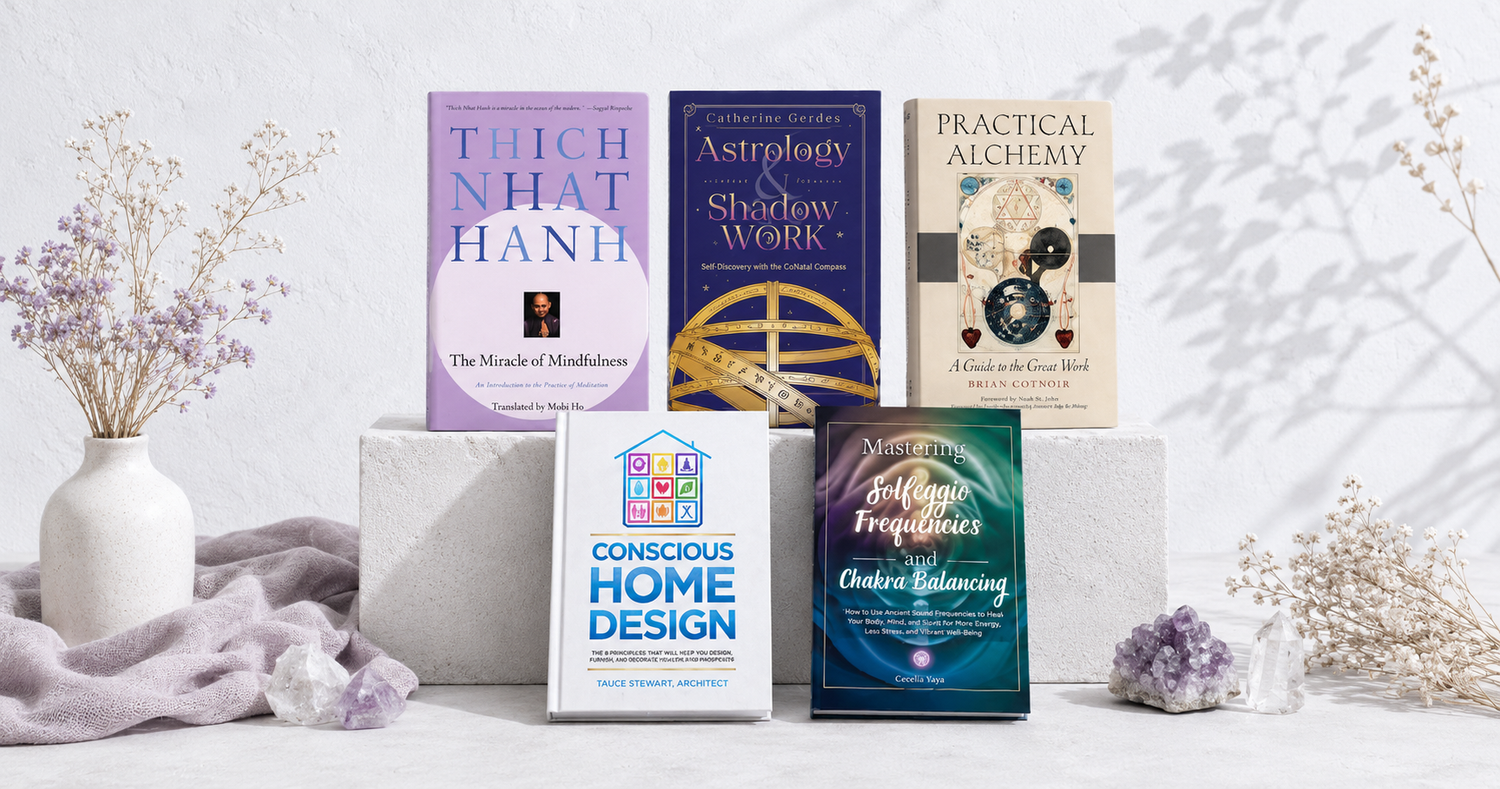 Books and guides collection featuring mindfulness, astrology, conscious home design, sound healing, and practical alchemy books in a bright Studio Botanical setting. — for Carpe Diem Dream