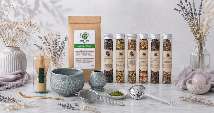 Here’s the Tea collection featuring Self-Love Tea, assorted loose-leaf tea tubes, a matcha whisk set, tea strainers, and a heart-handled infuser in a bright botanical studio setting. — for Carpe Diem Dream