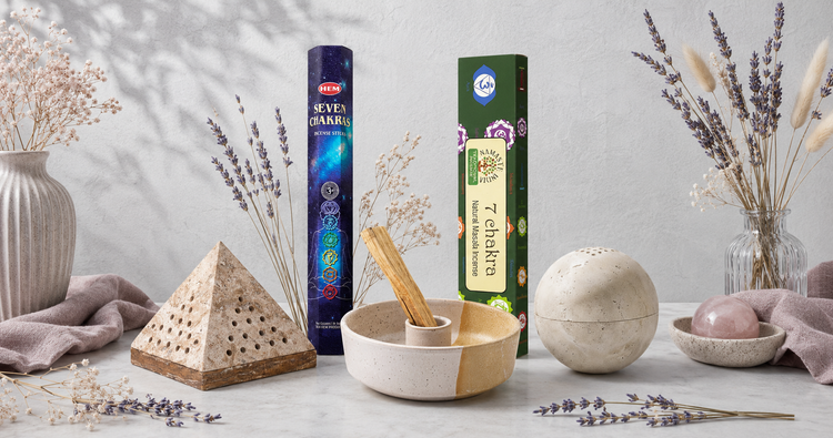 Incense & Burners collection featuring chakra incense sticks, a travertine pyramid burner, travertine sphere burner, and ceramic palo santo holder in a bright botanical studio setting. — for Carpe Diem Dream