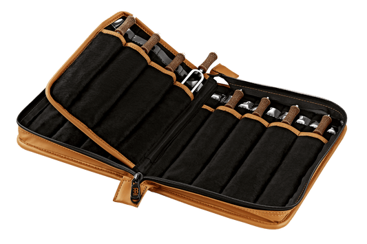 Open leatherette case containing sixteen planetary tuning forks with cork handles arranged in individual slots. — for Carpe Diem Dream