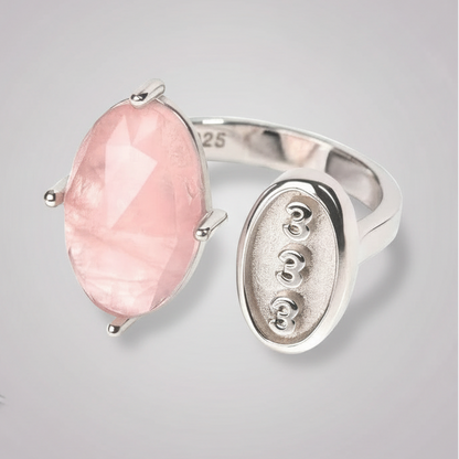 Rose quartz and silver 333 angel number ring centered on a soft studio surface with natural shadow. — for Carpe Diem Dream