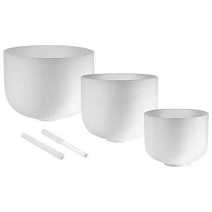 Three white frosted quartz crystal singing bowls in 12 inch, 10 inch, and 8 inch sizes with two mallets and silicone rings displayed on a transparent background — for Carpe Diem Dream
