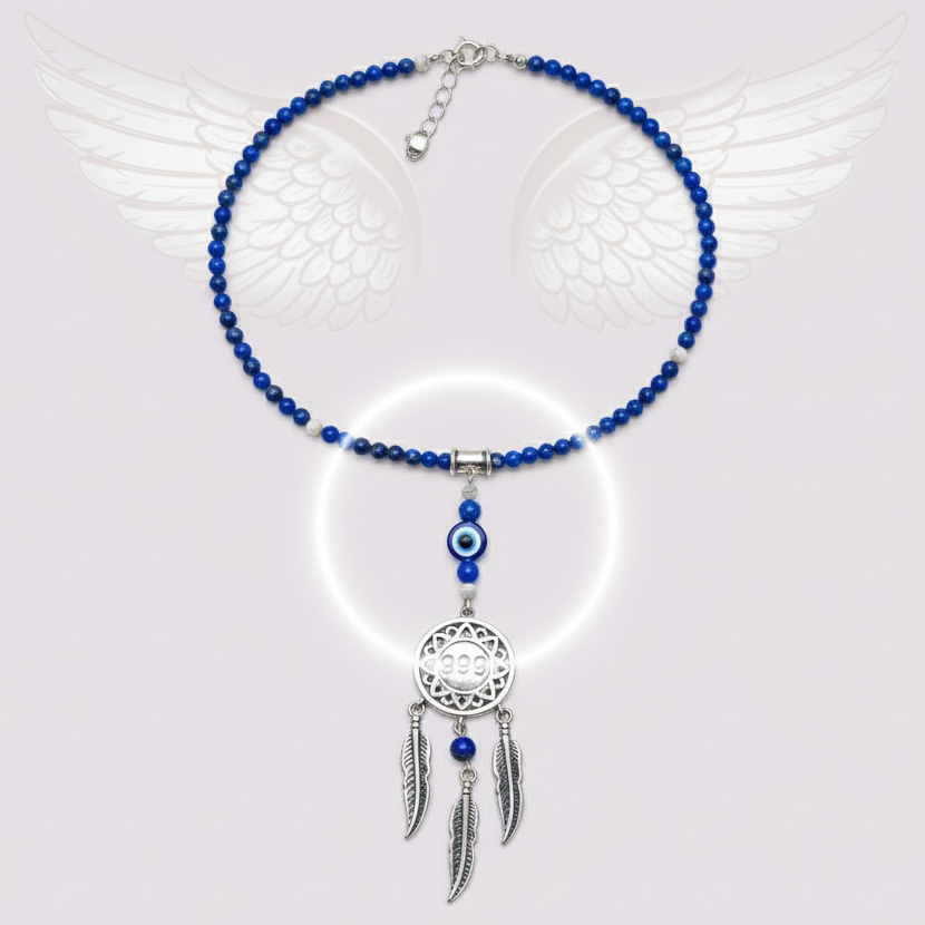 Silver dream catcher necklace with 999 angel number pendant and blue gemstone bead chain arranged flat on angel wings background. — for Carpe Diem Dream
