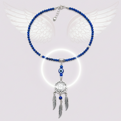 Silver dream catcher necklace with 999 angel number pendant and blue gemstone bead chain arranged flat on angel wings background. — for Carpe Diem Dream
