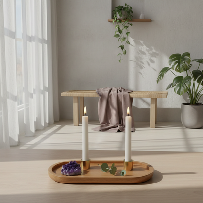 Acacia wood oval tray styled with taper candles and an amethyst crystal in a softly lit minimalist sanctuary-inspired interior. — for Carpe Diem Dream