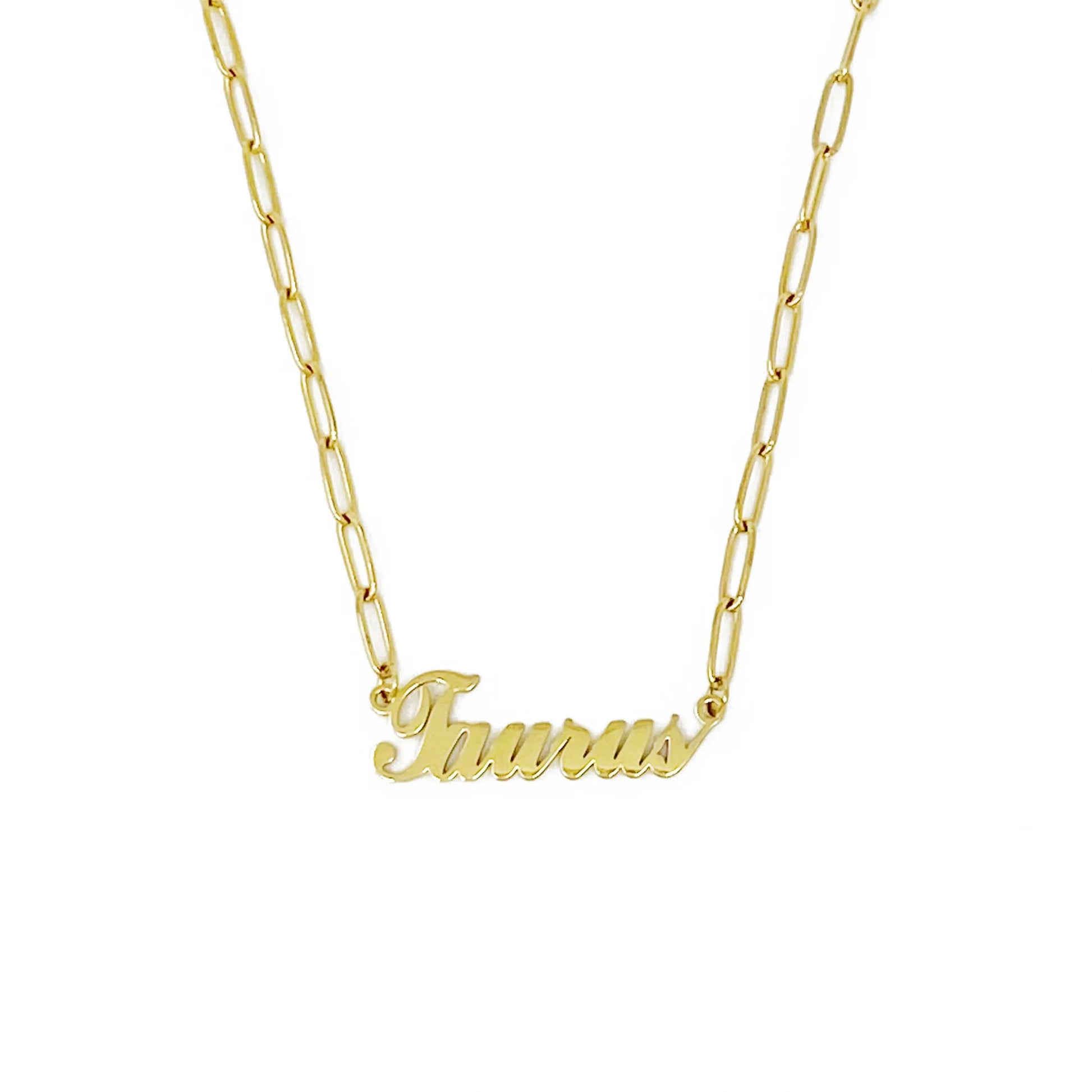 Gold Annie Zodiac Chain Necklace with scripted Taurus constellation pendant, displayed on white background