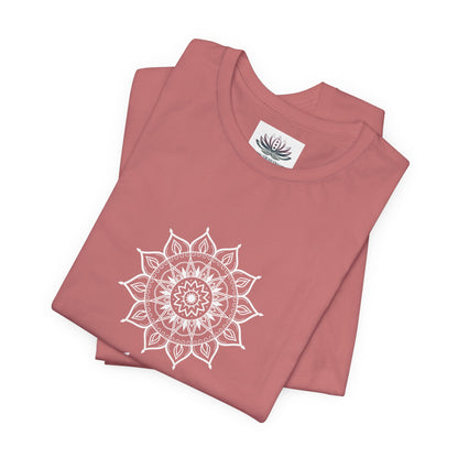 Aquarius Sun I Know zodiac T-shirt in mauve with white sun-inspired mandala artwork, shown folded with Carpe Diem Dream neck label in a supplier mockup. — for Carpe Diem Dream