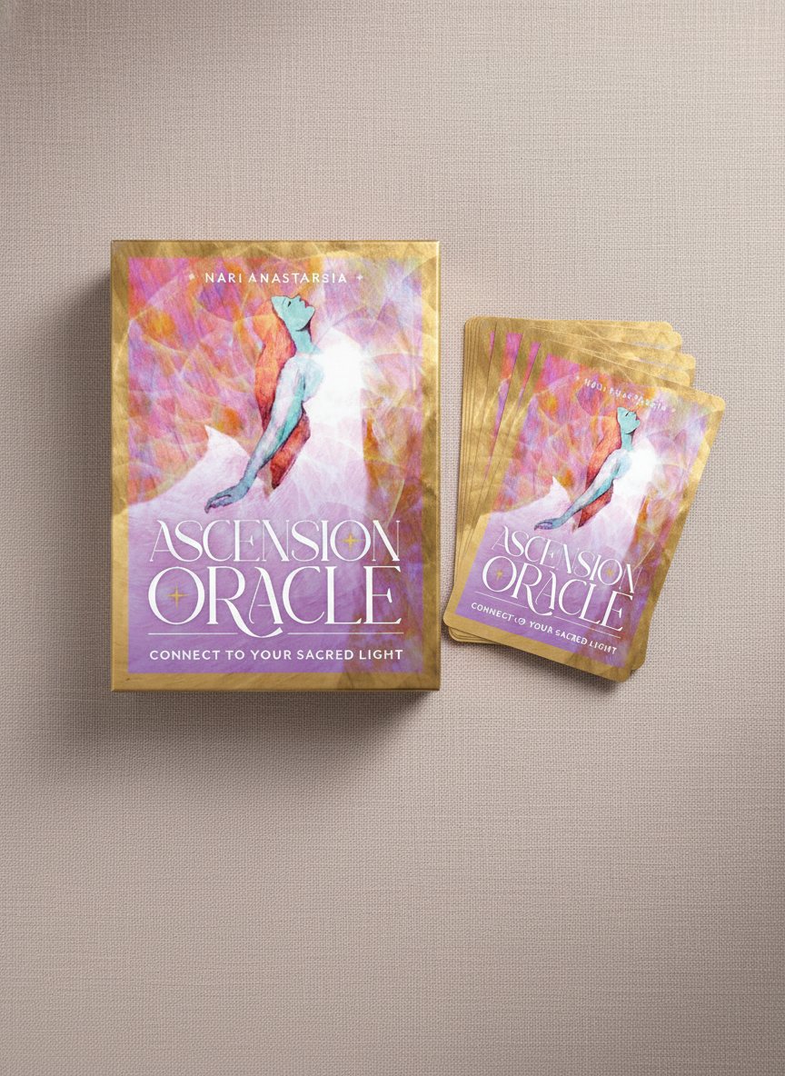 Ascension Oracle deck displayed on a soft neutral background with its cover and cards partially fanned, showcasing luminous pastel artwork – for Carpe Diem Dream.