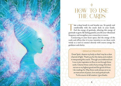 “How to Use the Cards” guidebook page from the Ascension Oracle Deck by Nari Anastarsia, featuring an ethereal blue and pink illustration of a serene face beside instructional text and an oracle prayer, styled for Carpe Diem Dream.