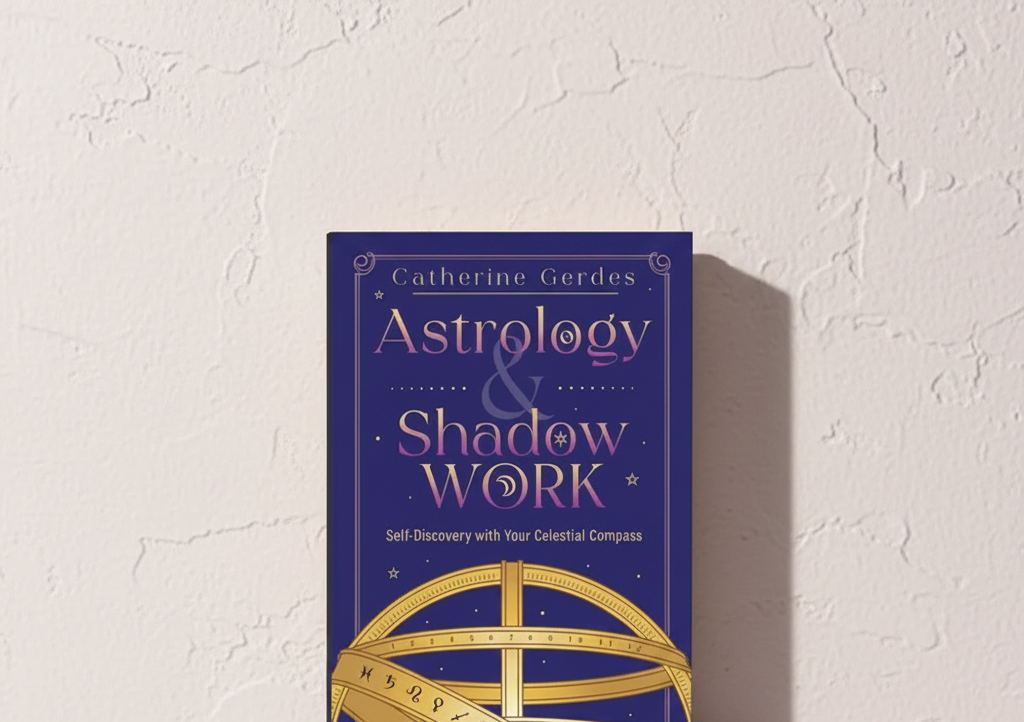 Astrology & Shadow Work by Catherine Gerdes standing upright against a softly textured plaster wall with clean editorial studio styling. — for Carpe Diem Dream