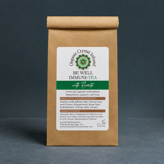 Be Well Immuni-Tea – Organic Crystal-Infused Tea with Fluorite displayed on the Carpe Diem Dream signature textured linen backdrop with matching linen surface, cool diffused daylight, soft contact shadow, and no props. — for Carpe Diem Dream
