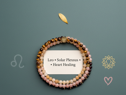 Flat-lay of gemstone bracelet set arranged in a circle with Leo, heart, and chakra symbols against a muted sage backdrop. — for Carpe Diem Dream