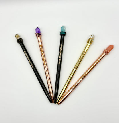 Metallic Busy Manifesting crystal mystic pens with faux crystal tops displayed in a full fan arrangement on white background — for Carpe Diem Dream