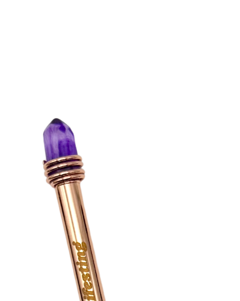Rose gold metallic Busy Manifesting crystal mystic pen with purple faux crystal top on white background — for Carpe Diem Dream