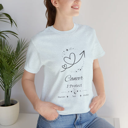 Model wearing a Heather Ice Blue Cancer Rising I Protect zodiac T-shirt with black celestial heart and arrow artwork. — for Carpe Diem Dream