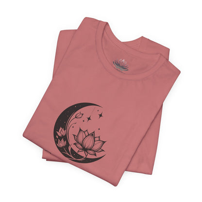 Capricorn Moon I Cherish Security zodiac T-shirt in mauve with black moon-inspired lotus, floral, and celestial artwork, shown folded in a supplier mockup. — for Carpe Diem Dream