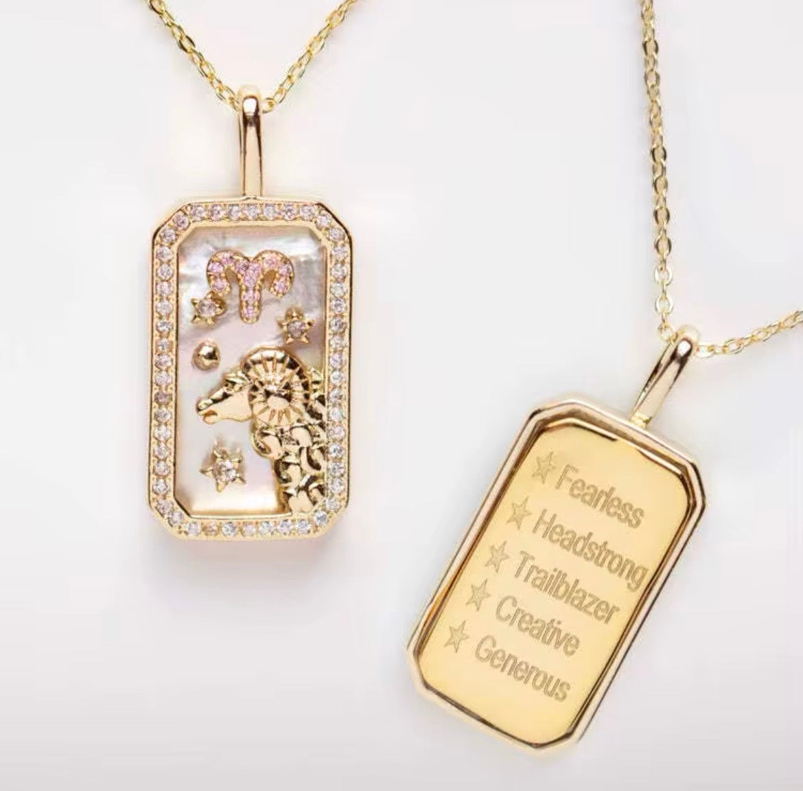 An 18K gold Aries zodiac pendant necklace with constellation detailing and engraved Aries traits displayed on a white background. — for Carpe Diem Dream