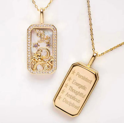 An 18K gold Capricorn zodiac pendant necklace with constellation detailing and engraved Capricorn traits displayed on a white background. — for Carpe Diem Dream