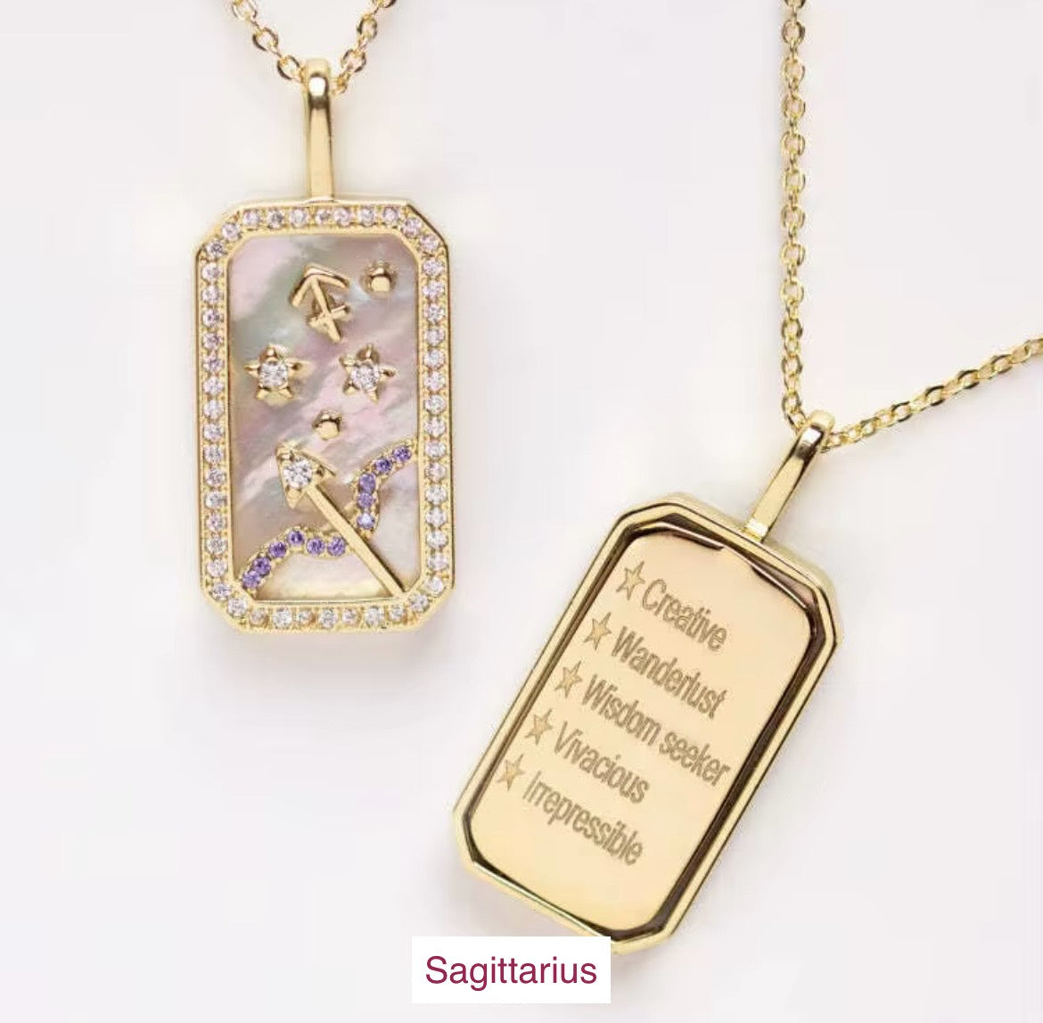 An 18K gold Sagittarius zodiac pendant necklace with constellation detailing and engraved affirmation text displayed on a white background. — for Carpe Diem Dream