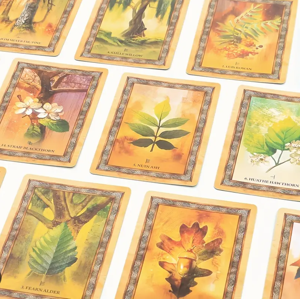 Multiple Celtic Tree Oracle cards arranged in a neat grid layout showing various tree illustrations on a white background. — for Carpe Diem Dream