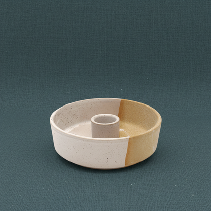 A ceramic palo santo burner shown without a smudge stick on a muted teal background with soft natural lighting. — for Carpe Diem Dream
