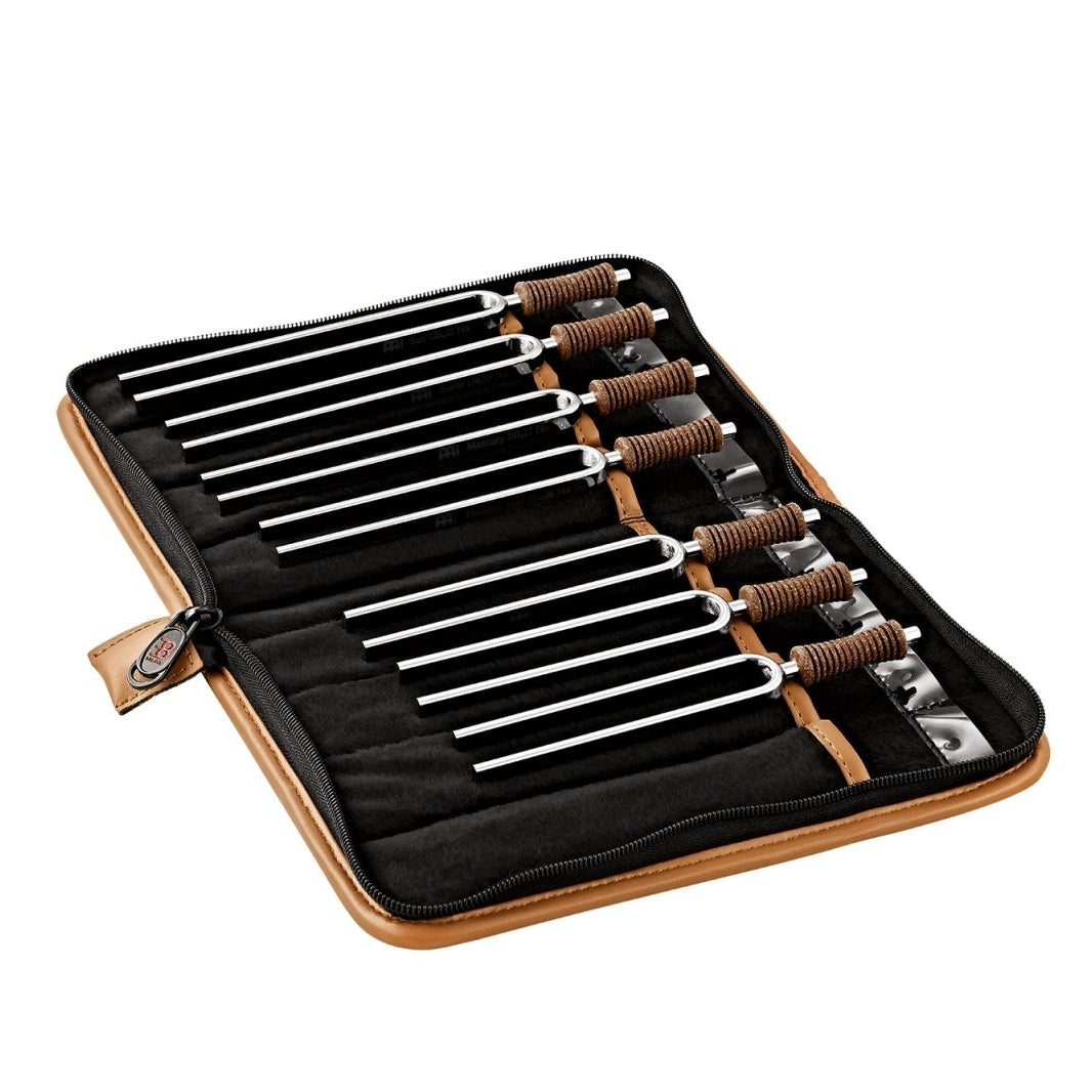 Seven chakra tuning forks with cork handles arranged in a portable zip travel case with fitted interior slots. — for Carpe Diem Dream