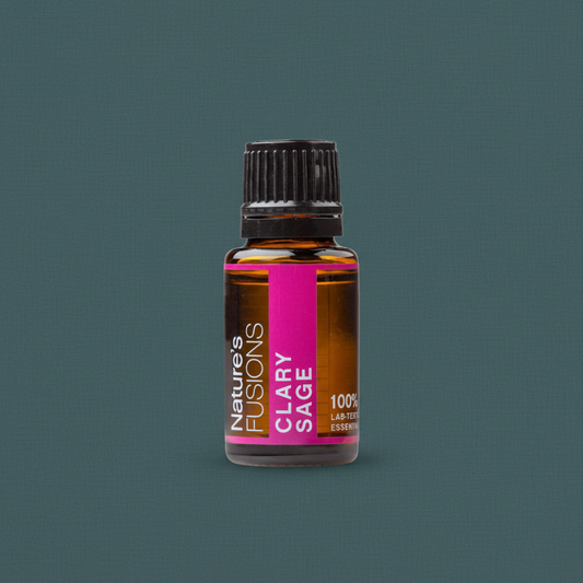 A 15ml amber glass bottle of Clary Sage essential oil with a black ribbed cap and pink label displayed upright against a muted teal background. — for Carpe Diem Dream