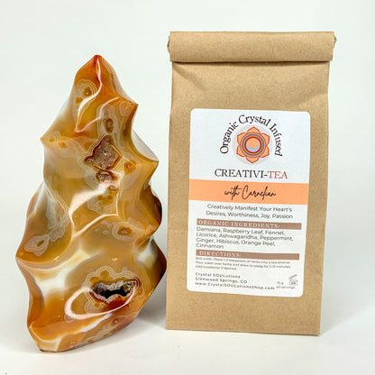 Creativi-Tea – Organic Crystal-Infused Herbal Tea with Carnelian in the authentic 75 g kraft bag supplier image, shown beside the original Carnelian crystal with the product packaging and label exactly as provided. — for Carpe Diem Dream