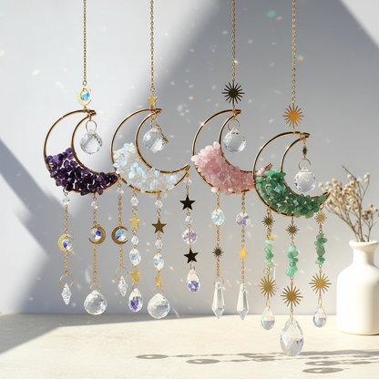 Multiple crystal moon suncatchers in different stone variations including amethyst, opalite, rose quartz, and green aventurine displayed side by side, showing color and style differences. — for Carpe Diem Dream