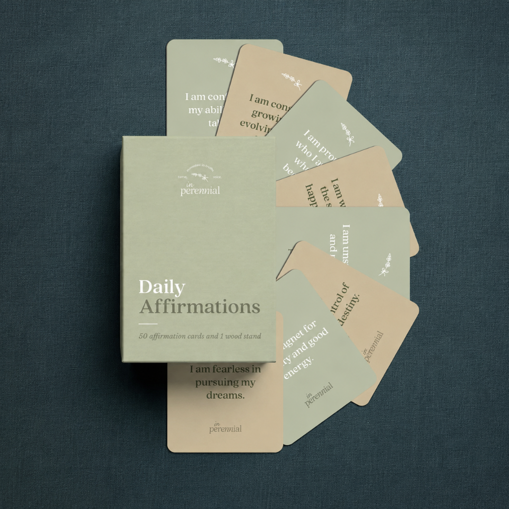 Daily affirmation cards and storage box on dark teal textured linen — for Carpe Diem Dream.