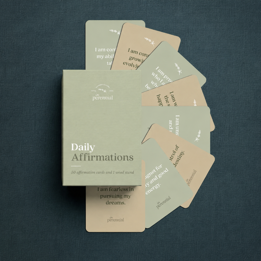 Daily affirmation cards and storage box on dark teal textured linen — for Carpe Diem Dream.