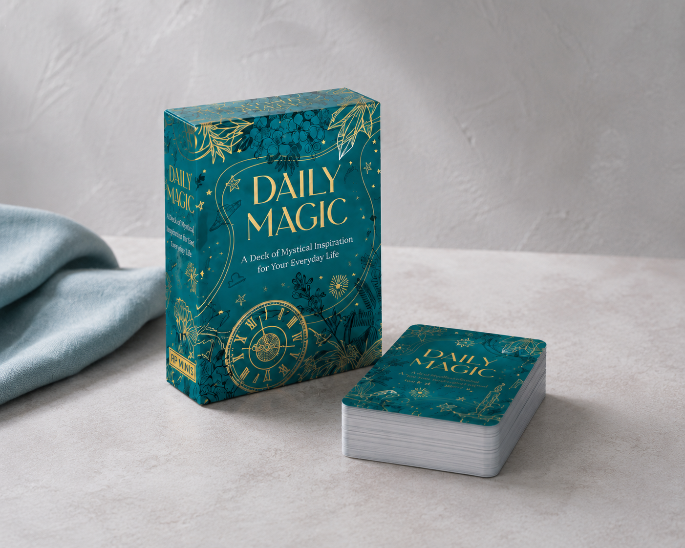Daily Magic inspiration deck by Maia Toll displayed in a professional editorial studio setting with cool natural light, textured surfaces, and refined minimalist styling that highlights the deck's craftsmanship and design. — for Carpe Diem Dream.