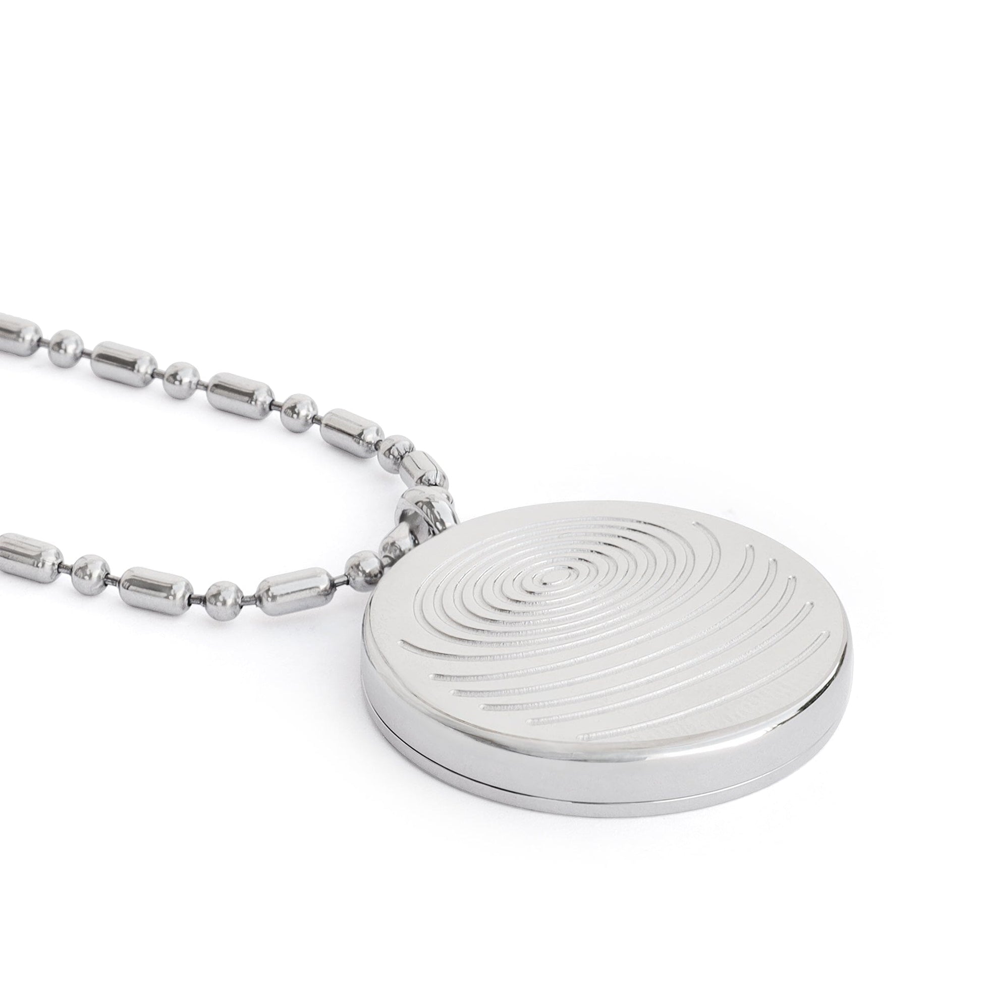 A close-up of a circular defense pendant with a white textured disc and silver beaded chain displayed on a clean white background, highlighting surface detail and finish. — for Carpe Diem Dream