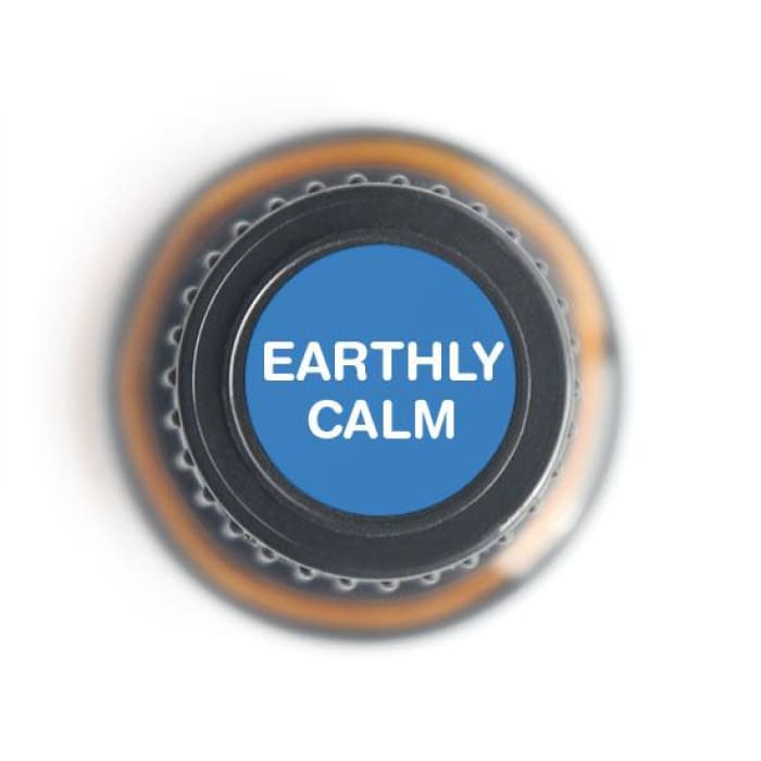 Top view of a 15ml Earthly Calm essential oil bottle showing a blue cap labeled "EARTHLY CALM" on a white background. — for Carpe Diem Dream