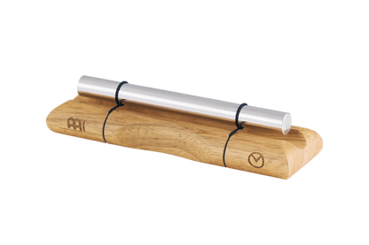 Close-up of a single planetary energy chime with silver metal bar on a wooden base engraved with a planetary symbol. — for Carpe Diem Dream