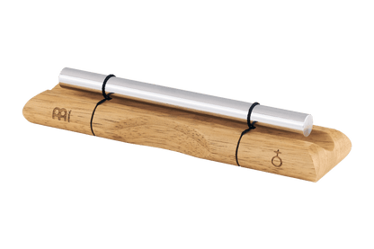 Close-up of a single planetary energy chime with silver metal bar on a wooden base featuring an engraved symbol. — for Carpe Diem Dream
