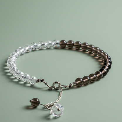 Clear Quartz and Smoky Quartz gemstone anklet displayed in a circular layout on soft sage surface with dangling charm — for Carpe Diem Dream