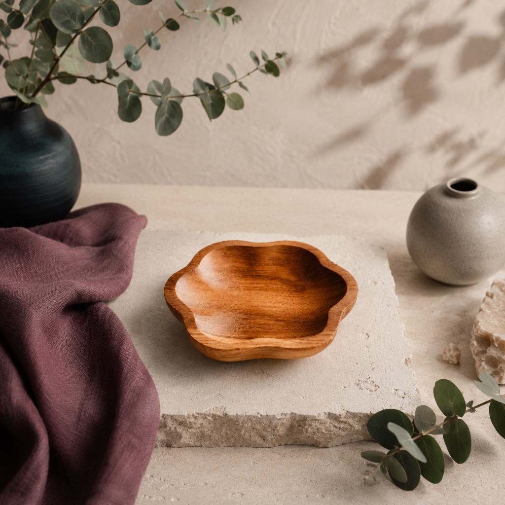 Hand-carved teak catch all dish styled in the Carpe Diem Dream botanical studio with mauve linen, eucalyptus, natural stone, and matte ceramics. — for Carpe Diem Dream