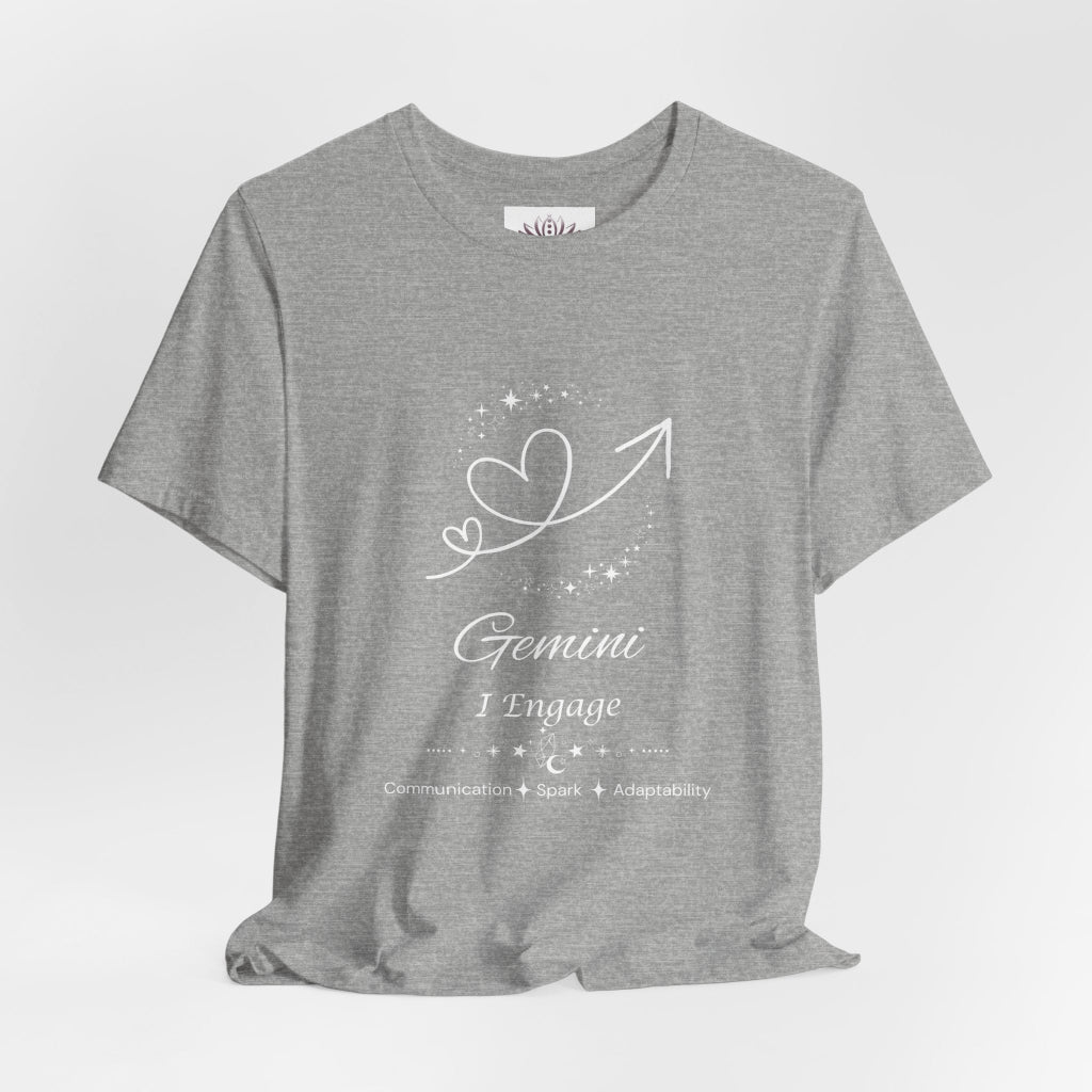 Gemini Rising I Engage zodiac T-shirt in Athletic Heather with white celestial heart and arrow artwork and Communication, Spark, Adaptability text, shown in a front supplier mockup. — for Carpe Diem Dream