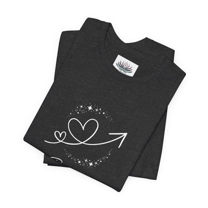 Gemini Rising I Engage zodiac T-shirt in Dark Grey Heather with white celestial heart and arrow artwork, shown folded in a supplier mockup. — for Carpe Diem Dream