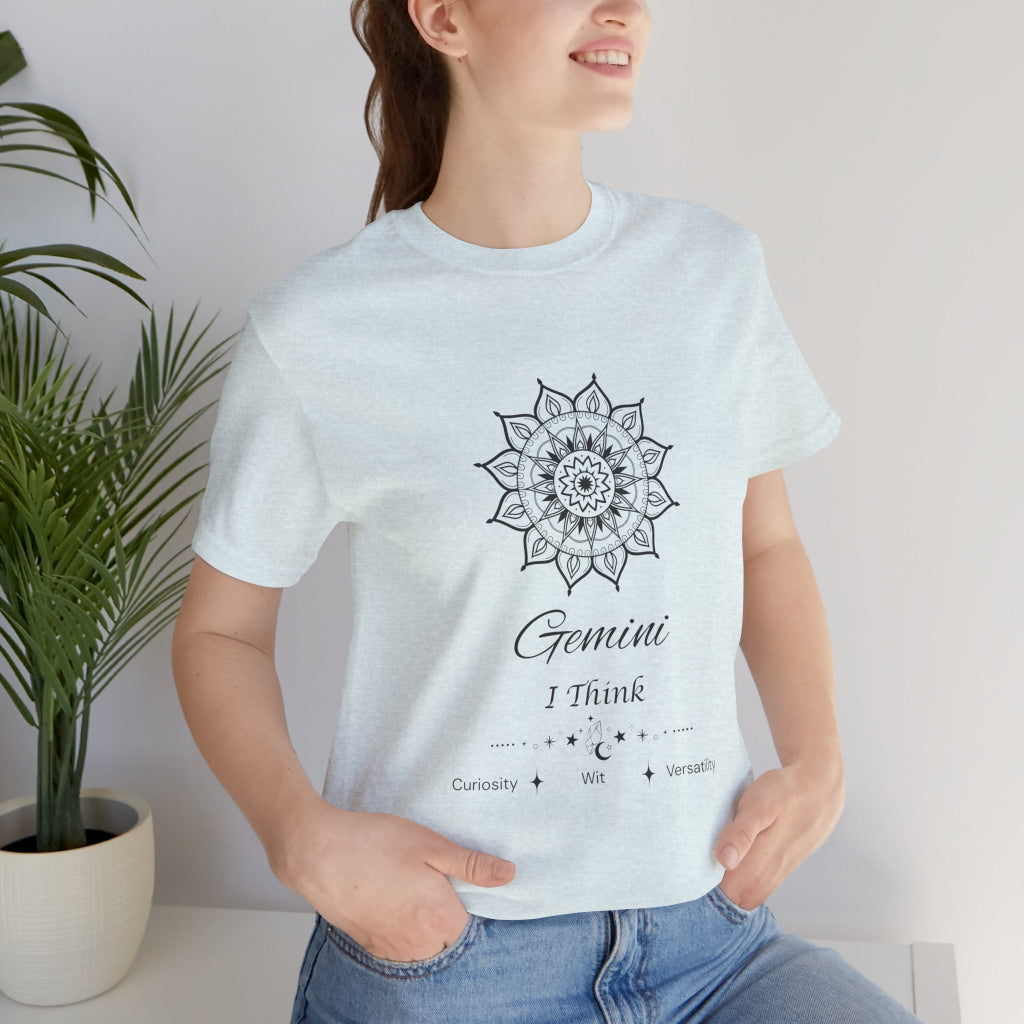 Gemini Sun I Think zodiac T-shirt in heather ice blue with black sun-inspired mandala artwork, shown worn by a model in a supplier mockup. — for Carpe Diem Dream