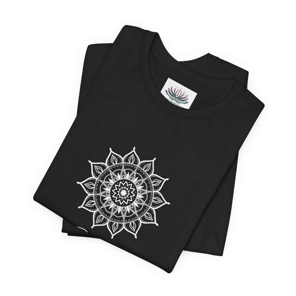 Gemini Sun I Think zodiac T-shirt in black with white sun-inspired mandala artwork, shown folded with Carpe Diem Dream neck label in a supplier mockup. — for Carpe Diem Dream