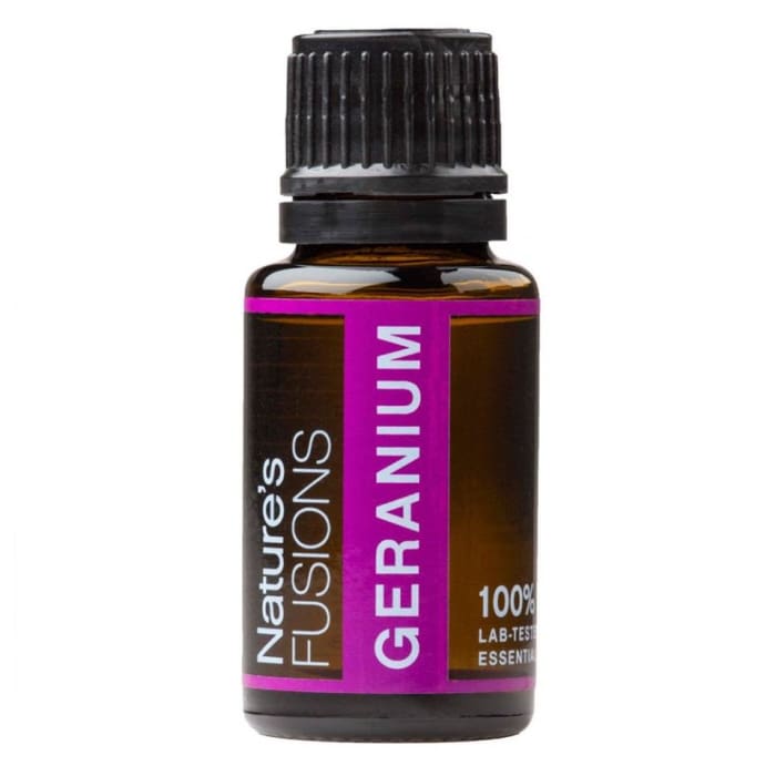 A 15ml amber glass bottle of Geranium essential oil with a black cap and magenta label displayed on a white background. — for Carpe Diem Dream