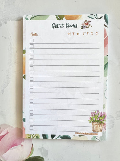 Close-up of a 4x6 checklist memo pad showing lined task sections and decorative border details. — for Carpe Diem Dream