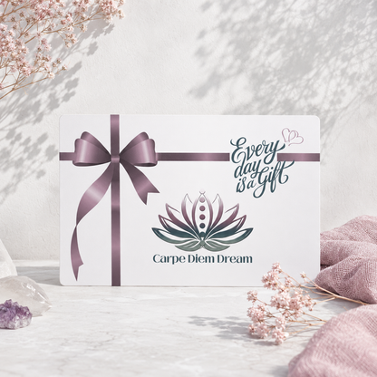 Carpe Diem Dream gift card styled with mauve ribbon, pale botanicals, crystals, and soft natural light. — for Carpe Diem Dream