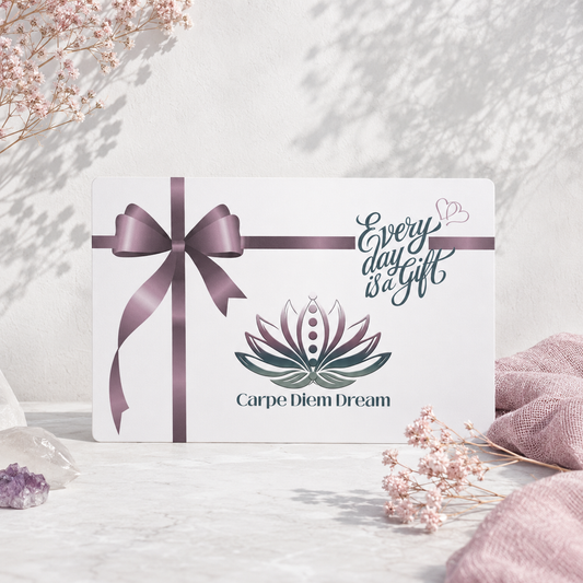 Carpe Diem Dream gift card styled with mauve ribbon, pale botanicals, crystals, and soft natural light. — for Carpe Diem Dream