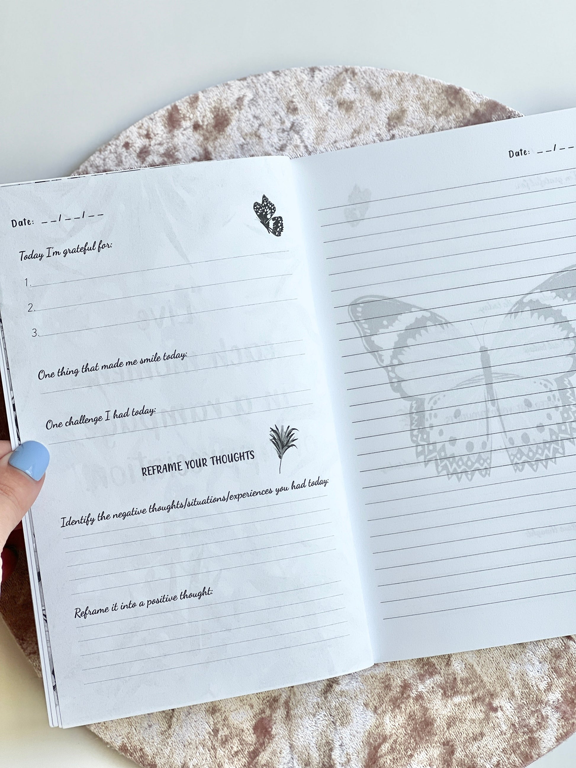 Interior spread of Gratitude Daily Journal showing guided gratitude prompts and lined reflection page with butterfly illustration on a neutral background — for Carpe Diem Dream